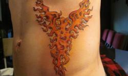 fire flame phoenix guy tattoo hip bird paradise